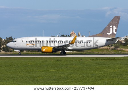 Luqa, Malta January 7, 2012: Jet Time Boeing 737-3L9 take off runway 31.