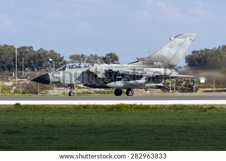 Luqa, Malta February 9, 2012: Italian Air force Panavia Tornado IDS on its take off run from runway 31.