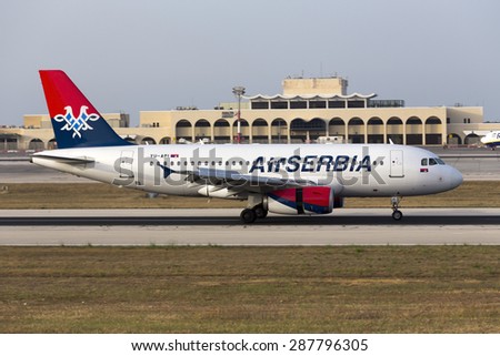 Luqa, Malta June 16, 2015: Air Serbia Airbus A319-132 landing 13, initial flight of scheduled flights for 2015.