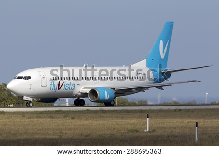 Luqa, Malta June 19, 2015: Fly Vista Boeing 737-3U3 (9H-AJW) preparing for take off from runway 31. FlyVista is a low cost airline based in Tbilisi, Georgia with flights to neighbouring countries.