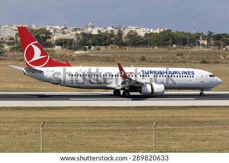 Luqa, Malta June 23, 2015: Turkish Airlines Boeing 737-8F2 landing runway 31 arriving from Istanbul.