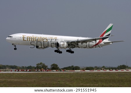 Luqa, Malta September 6, 2008: Emirates Boeing 777-31H landing runway 31.