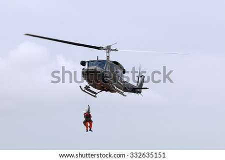 Luqa, Malta September 26, 2014: Italian Air Force Agusta AB-212AM based in Malta performing a rescue demonstration.
