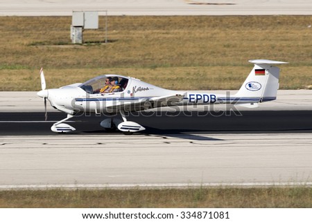 Luqa, Malta June 30, 2015: Diamond DA-20 [D-EPDB] just landed runway 31 and preceding to the end of the runway for apron 3.
