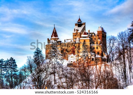 Beautiful famous castle of Dracula in Bran town, Transylvania region, Romania, in winter season. Travel Bran - Brasov, Romania