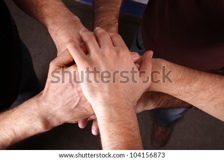 an image of hands clasped showing determination