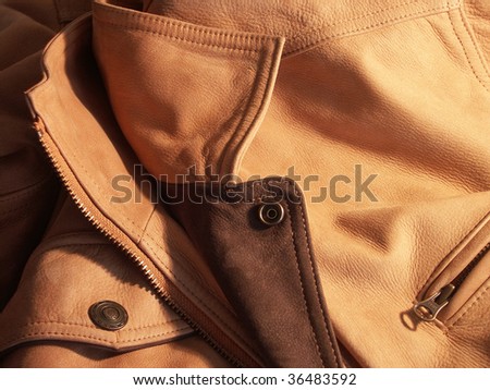 close up shot of a leather man coat
