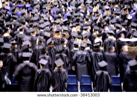 an image of students at graduation ceremony (motion blur)