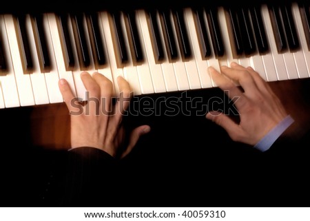 an elevated view of a man playing piano