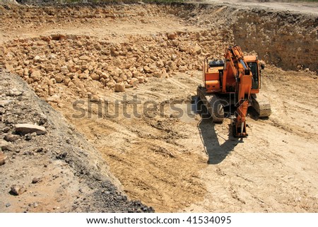 an image of grader at the construction zone