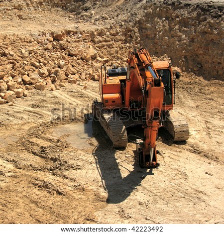 an image of grader at the construction zone