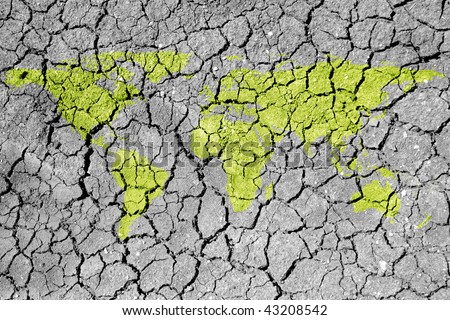 conceptual image of dried soil with flat world map