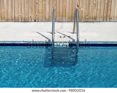 An image of swimming pool and ladder