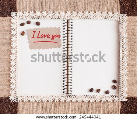 Vintage frame with clean sheets for text and background. Coffee beans and note sticker that says \