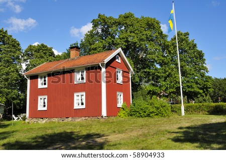 An old Swedish House painted with the Typical Swedish red copper based paint.