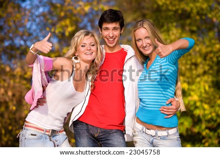 Thumbs up (one man and two women)