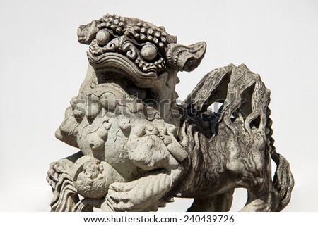 Stone Lion sculpture, symbol of protection & power in Oriental Asia, Wat Pho, Bangkok, Thailand
