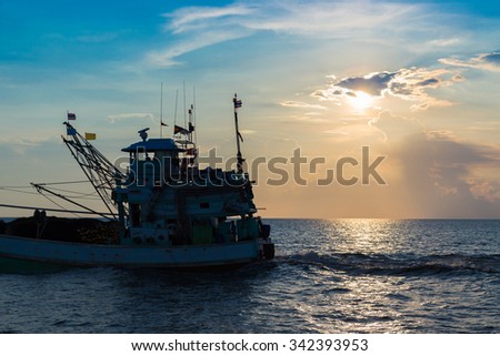 Beautiful sunrise sky that a good day to start work of fishing boat