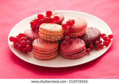 Red fruit flavored macarons with the berries
