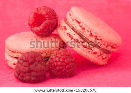 Red fruit flavored macaroons with the berries