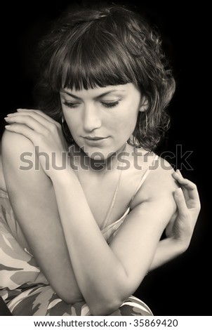 Portrait of a calm beautiful woman sepia toned