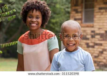 African American mom spending time with her son. Mother and son. Single parent. Family.