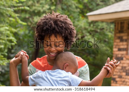 African American mother and son spending time together.