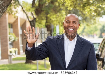 African American businessman saying hello.