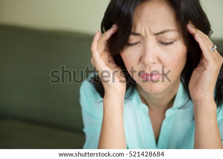 Women with a headache.