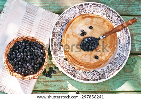 Pancakes with blueberries . top view.