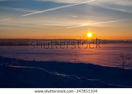 Sunrise in winter frosty day