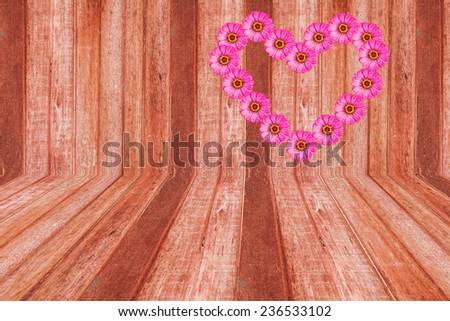 pink heart zinnia flower and wall wood