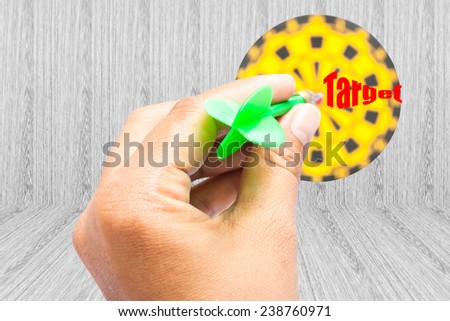 hand hold darts go to target