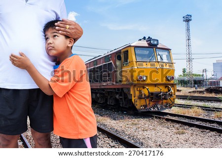 son embrace his father with sad because father leave   to work