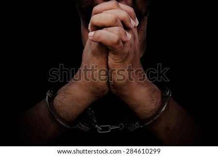 abstract of the man was bound by hand in the shackle of black man out of freedom