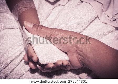 vintage of mother take care her son, little boy Sick lying in a hospital IV.