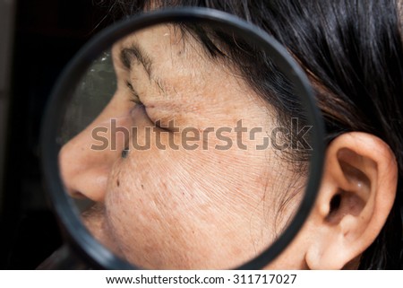 skincare and health concept - wrinkles  on the face