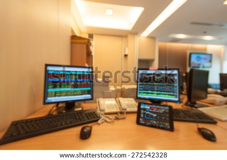 Monitor computer and monitor tablet stock market analysis for stock trading.Blur for background.