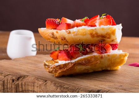Bruschetta with strawberry, cheese, basil and balsamic vinegar