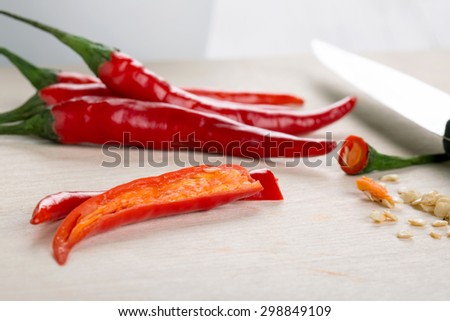 Red cayenne pepper. De-seed hot chili peppers before chopping.