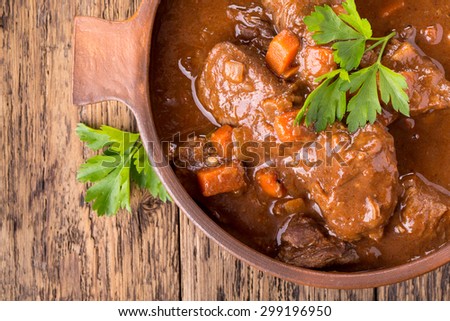 Beef stew with carrot. Top view.