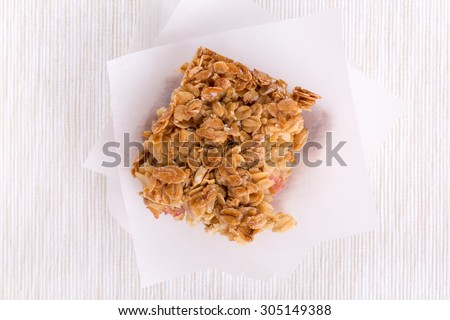 Homemade healthy flapjacks.  Oat bars with honey and currant. Top view.