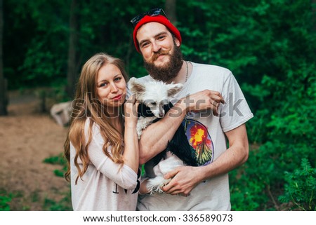 Couple and little dog. Family