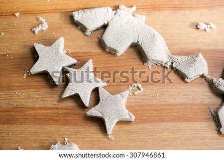Star shaped kinetic sand on a table