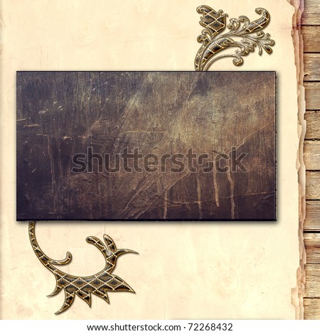 metal plate on wood background (vintage collection)