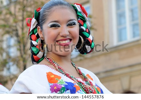 WARSAW - AUGUST 27: Dancer of folklore ensemble \