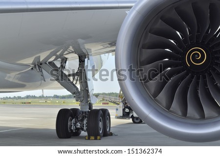 WARSAW - AUGUST 4: Landing gear and engine of the Boeing 787 Dreamliner, while parked at Chopin Airport on August 4, 2013 in Warsaw, Poland.