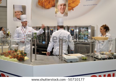 WARSAW - MARCH 26: Cooks at work - 14th International Food Service Trade Fair. March 26, 2010 in Warsaw, Poland.