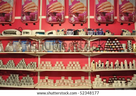 WARSAW - APRIL 10: Display shelf of nail designs accessories. Beauty Showroom 2010 - Trade fairs of Cosmetics products and services. April 10, 2010 in Warsaw, Poland.