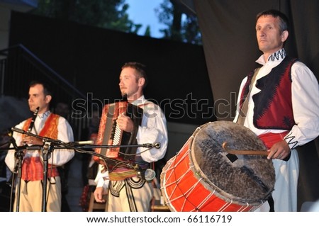 WARSAW - AUGUST 19: The National Folklore Ensemble from Albania - perform folk music during the International Folklore Festival \